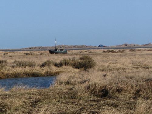 The Old Lifeboat Station on Blakeney Point in the distance