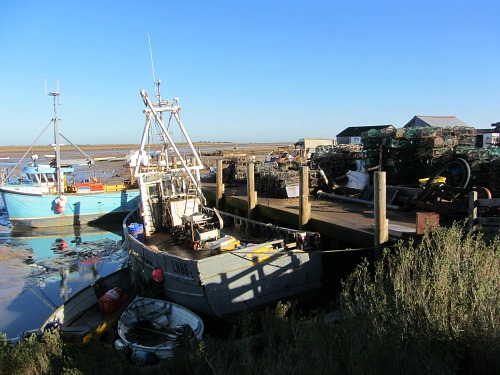 The working fishing harbour at Brancaster Staithe Norfolk The working fishing harbour at Brancaster Staithe Norfolk