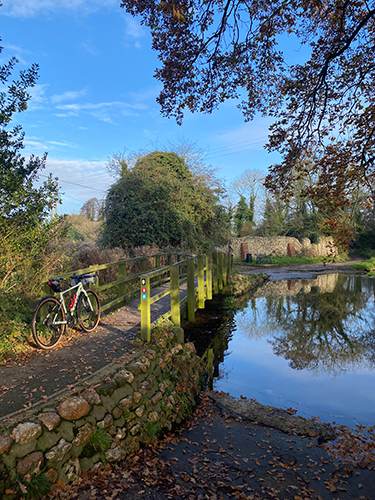Cycle over the ford at Castle Acre Cycle over the ford at Castle Acre