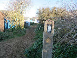 The National Trails acorn sign on the Norfolk Coast Path