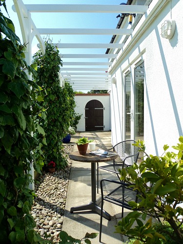 The pergola outside Martin's Nest, Big Sky Cottages The pergola outside Martin's Nest, Big Sky Cottages