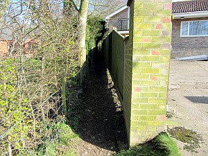 The slightly obscured public footpath at end of East Runton The slightly obscured public footpath at end of East Runton