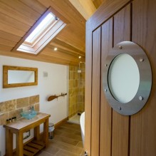 The detail of the porthole on the bathroom The detail of the porthole on the bathroom