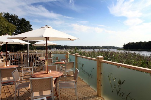 The terrace overlooking Rollesby Broad at The Waterside, Norfolk