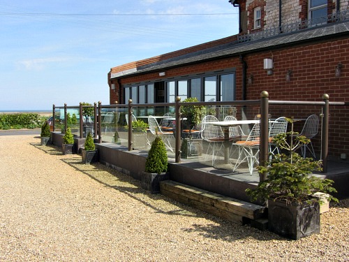 Titchwell Manor terrace with superb views Titchwell Manor terrace with superb views
